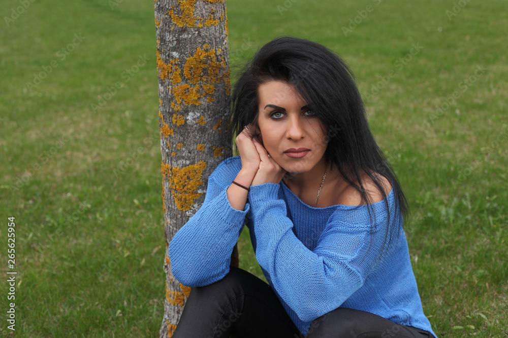 portrait of a young beautiful woman in the park portrait of a young beautiful woman in the park