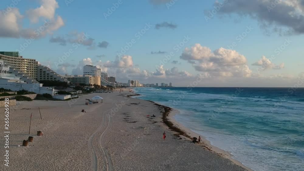 Drone flying above shore line with hotels Drone flying above shore line with hotels