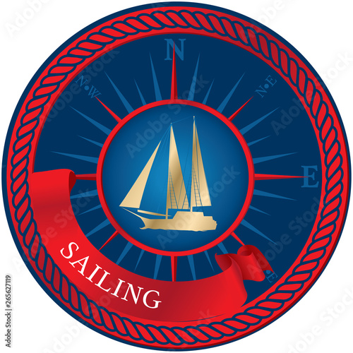 Blue emblem with sailboat, compass and ribbon.
