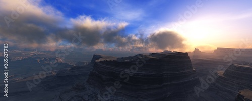 Canyon at sunset, panoramic view of the canyen under a sky with clouds
