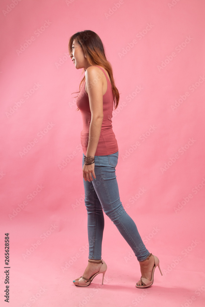 Full body of beautiful young asian woman walking. Full body of beautiful young asian woman walking.