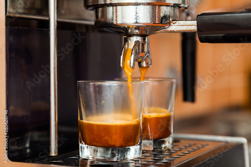 Close-up of espresso pouring from coffee machine