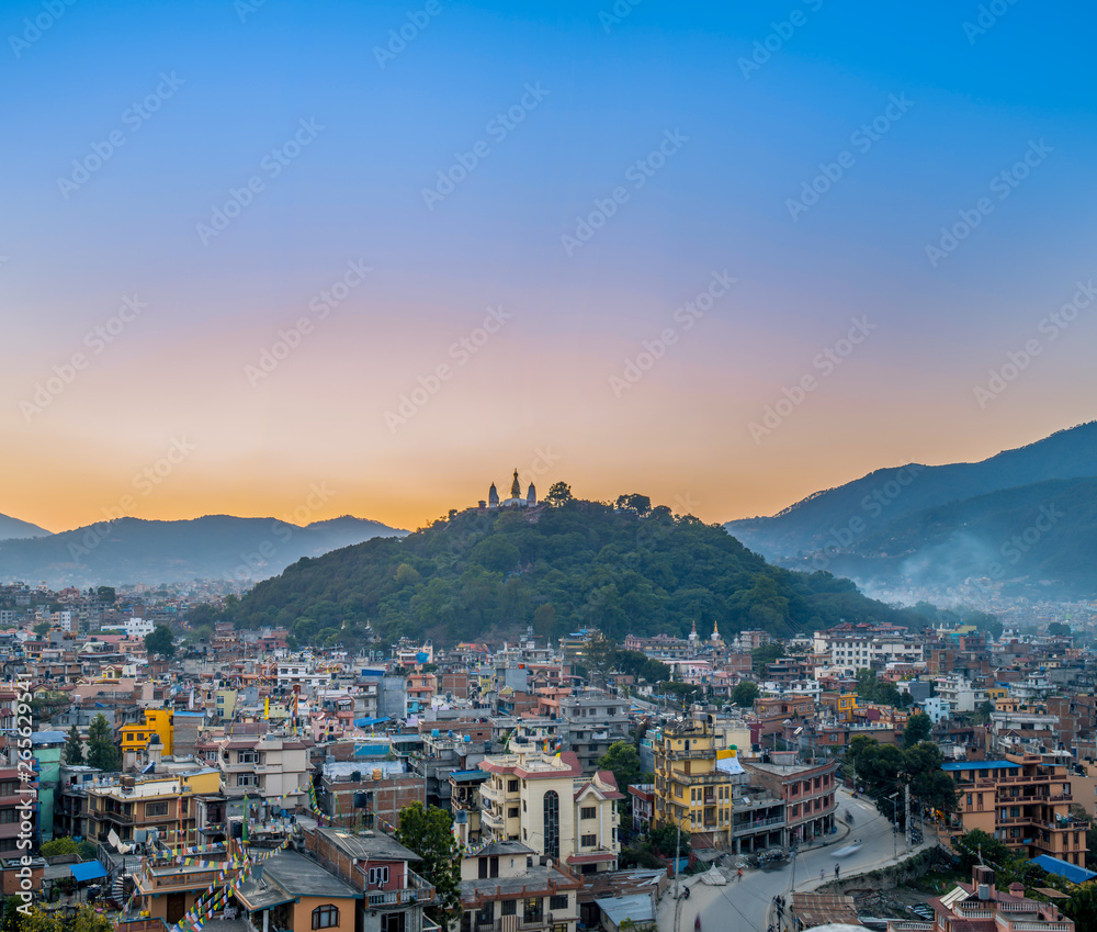 Cityscape over the swayambhunath temple in Kathmandu at sunset