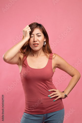 Young Asian woman got sick and  headache.