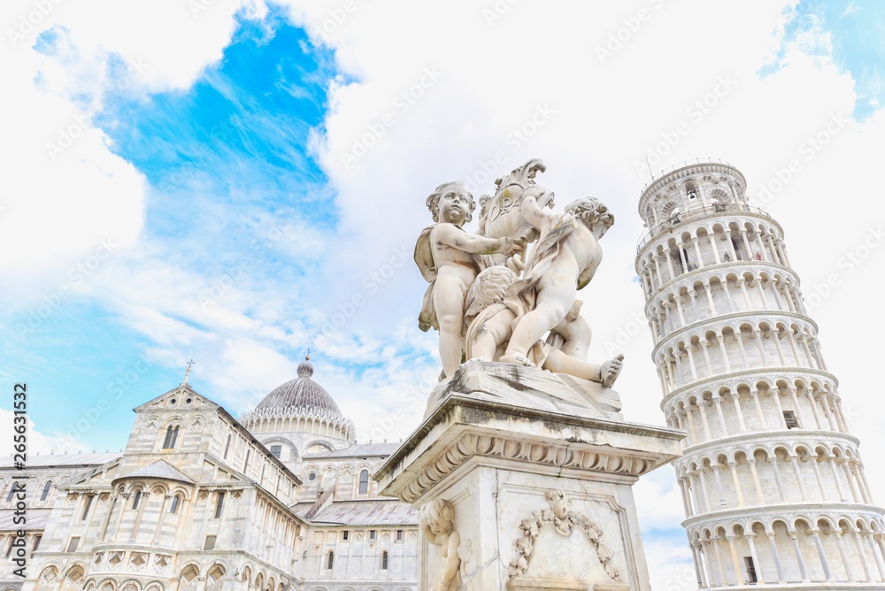 Cherub Statue, Leaning Tower of Pisa, and Pisa Cathedral on Sunny Day