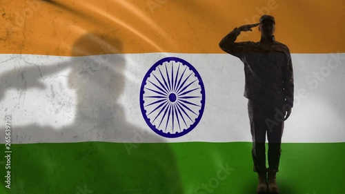 Indian soldier silhouette saluting against national flag, professional army photo