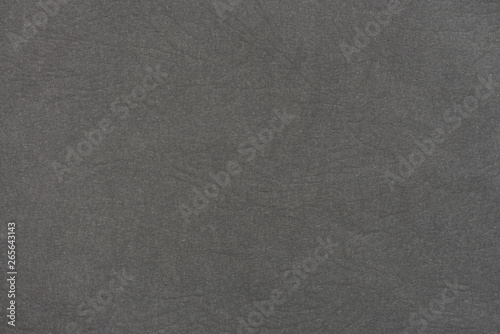 Old black paper texture background. Seamless kraft paper texture background. Close-up paper texture using for background. Paper texture background with soft pattern. Highly detailed paper background.