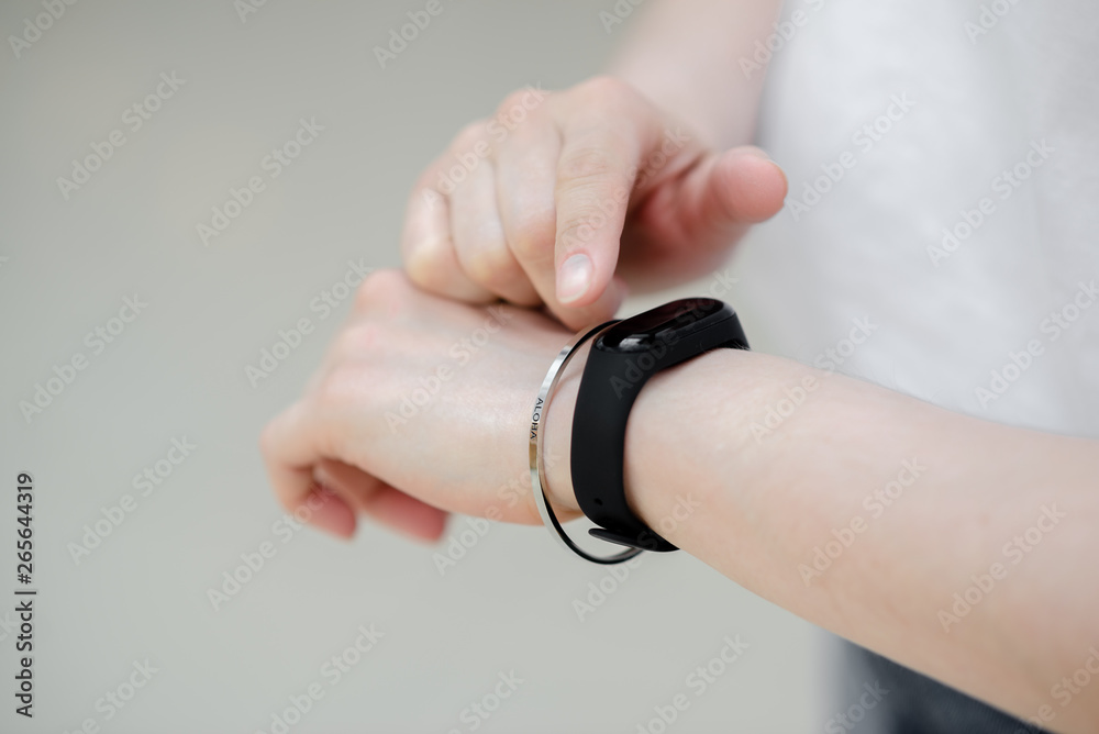 Female hand with smart bracelet.Smart watch on the wrist. Female hand with smart bracelet.Smart watch on the wrist.