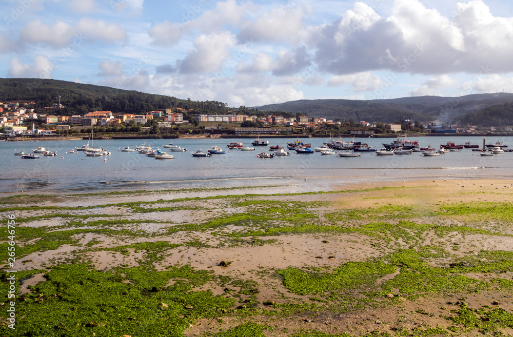 Sand beach in the north of Spain in a cloudy day. Sand beach in the north of Spain in a cloudy day.