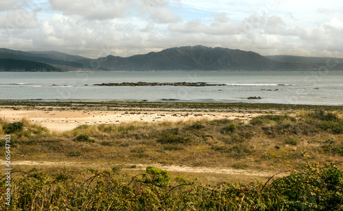 Sand beach  in the north of Spain in a cloudy day.