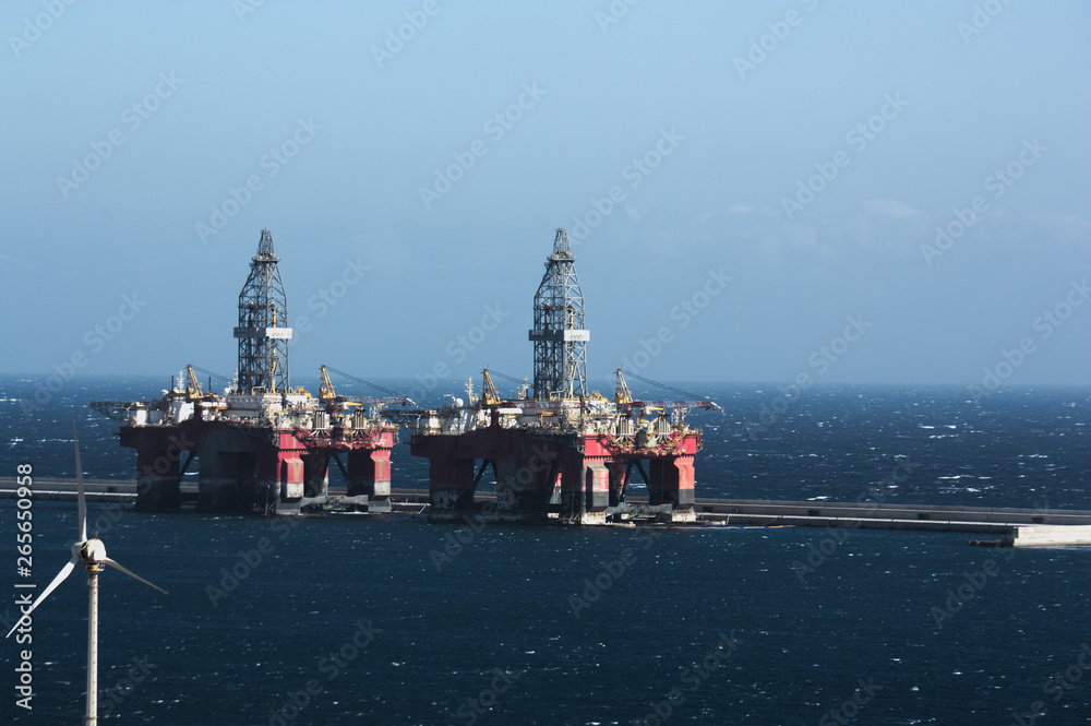 Oil rigs moored to safe harbor