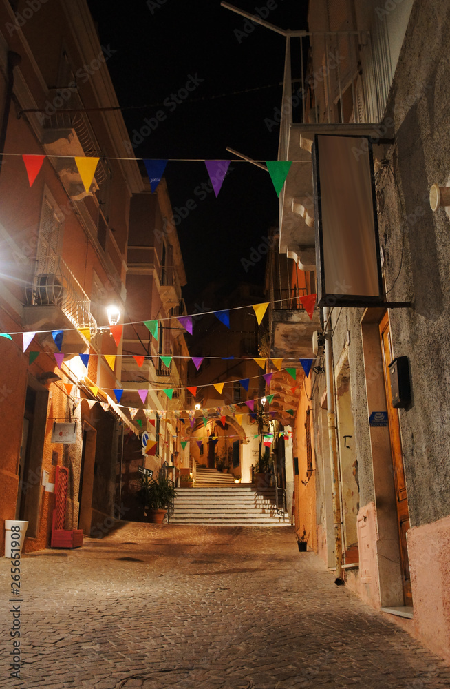 Night evening streets in the old European southern tourist city on the southern island.