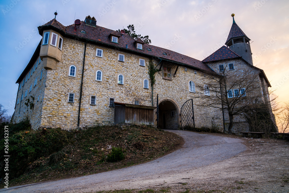 Germany, Castle gate of ancient castle teck on swabian alb mountain in magic sunset atmosphere