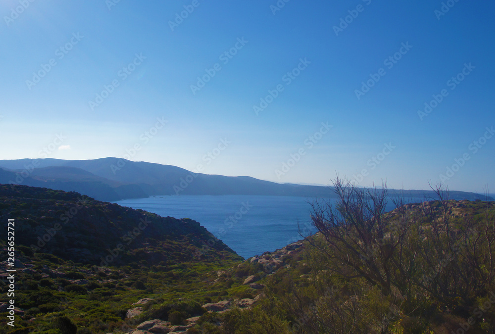 View of the blue azure sea lagoon gulf of the ocean. Summer heat nature on the southern island of the mountain rocks stones. View of the blue azure sea lagoon gulf of the ocean. Summer heat nature on the southern island of the mountain rocks stones.