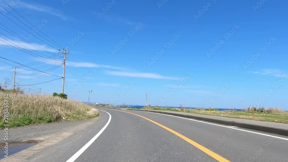 Driving picture. Slow curve near the sea Driving picture. Slow curve near the sea