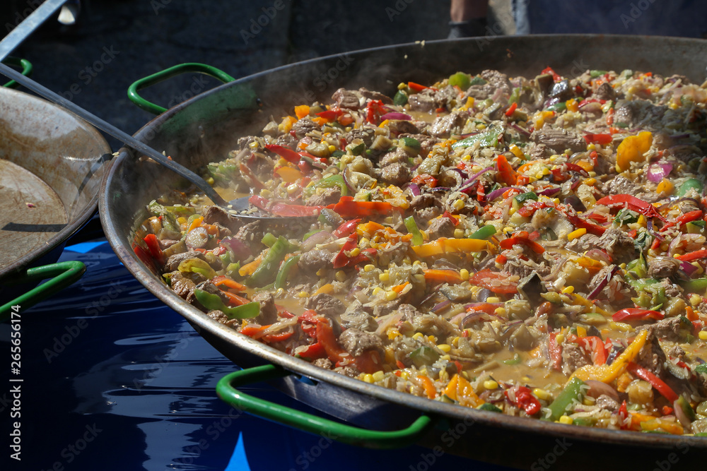 A dish of rice, vegetables and meat A dish of rice, vegetables and meat