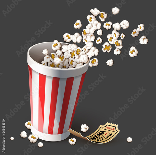 Popcorn in paper bucket. Full cup for snacks in movie theater fast food. Gold cinema ticket for film entertainment. Realistic, isolated on gray background. Eps10 vector illustration.