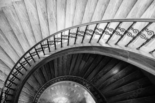 Fotografering wooden spiral steps in black and white