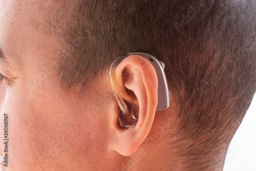 Closeup photo of ear with hearing aid