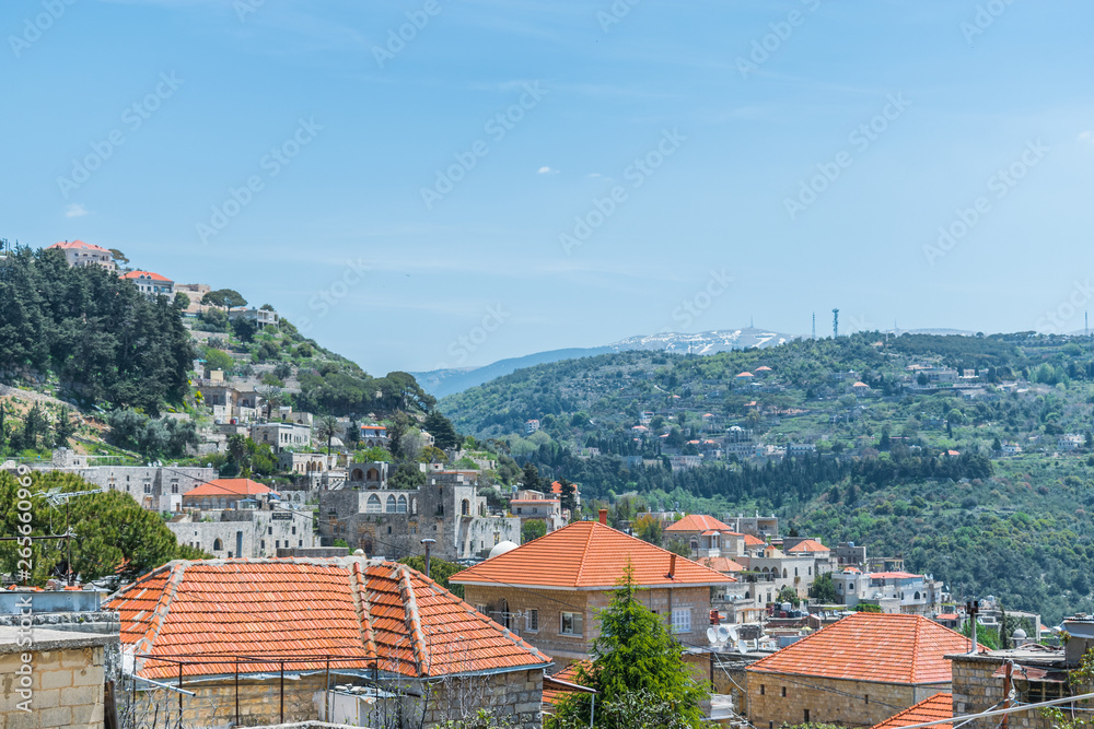 This is a capture of Der El Kamar a village Located in Lebanon, where you can see the traditional architecture of the houses with orange roof tiles and white stones