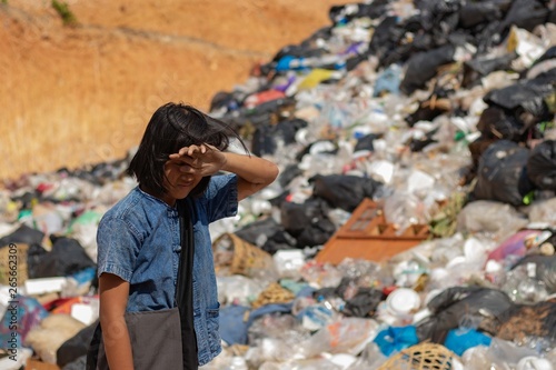 Children find junk for sale and recycle them in landfills, the lives and lifestyles of the poor, Child labor, Poverty and Environment Concepts