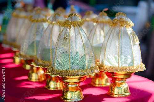 Engagement bowl for Thai engagement ceremony. bride price set, made from banana leaf and garland in thai wedding ceremony forr contain wedding ring and flower photo