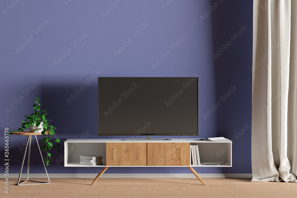TV on the cabinet in modern living room on blue wall background TV on the cabinet in modern living room on blue wall background
