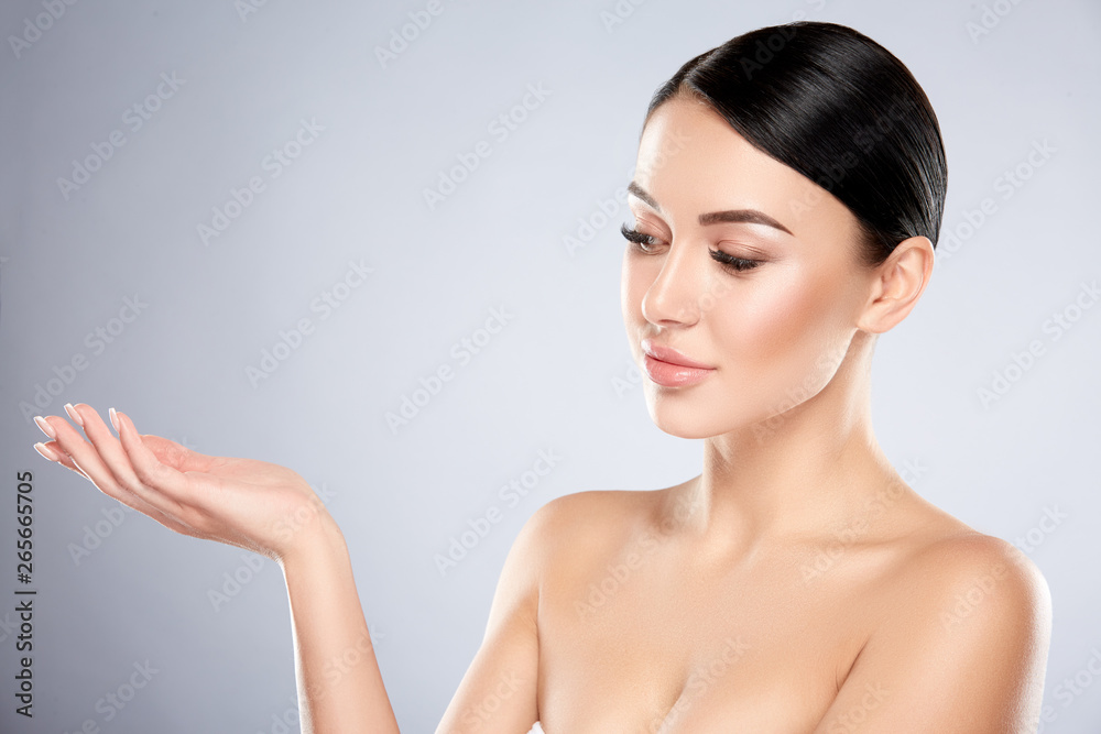 Darkhaired girl with nude make up at studio Darkhaired girl with nude make up at studio