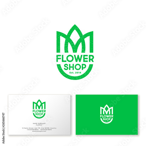 Flower shop logo. Business card. Tulip with letters like heraldic shield. The emblem for the garden shop.