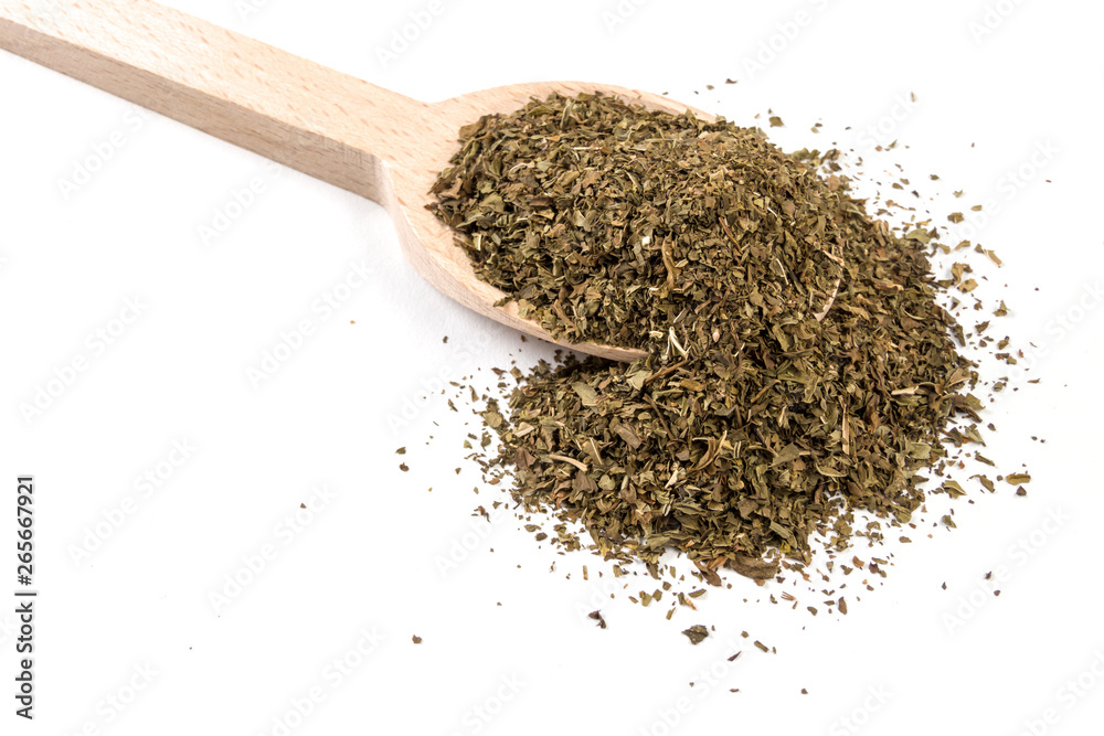mint leaves on wooden spoon on white background mint leaves on wooden spoon on white background