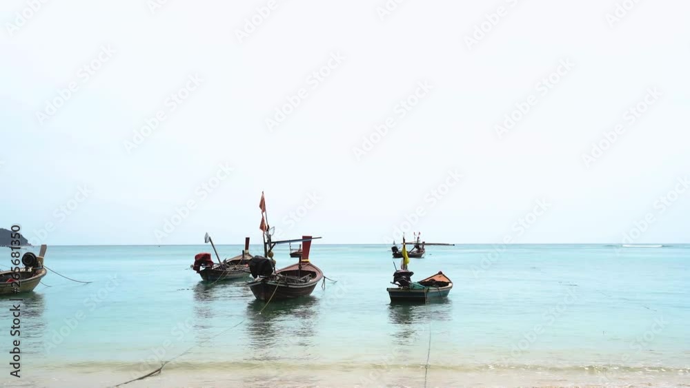 White Nai Yang Beach, fishing boat sea water in the morning,Near the airport tropical at phuket Thailand. White Nai Yang Beach, fishing boat sea water in the morning,Near the airport tropical at phuket Thailand.