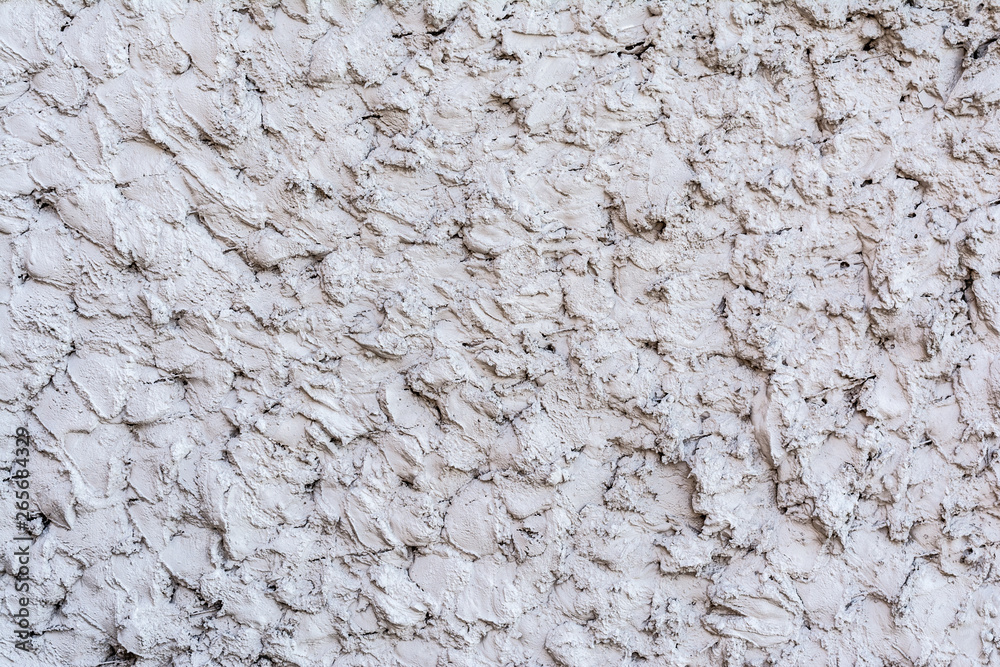 gray texture of a concrete wall, layer of decorative plaster, abstract background gray texture of a concrete wall, layer of decorative plaster, abstract background