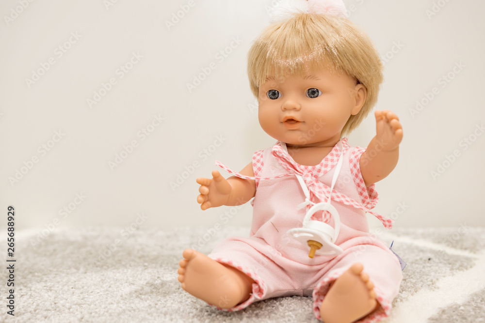 Close-up of a beautiful handmade, aromatic doll. Kids games, motorcycle and enrichment of children's emotions, preparation for real life. Close-up of a beautiful handmade, aromatic doll. Kids games, motorcycle and enrichment of children's emotions, preparation for real life.