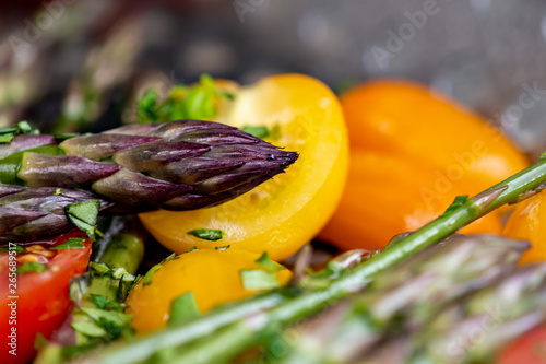 Asparagus with Cherry Tomatoes and Herbs in a Grill Basket