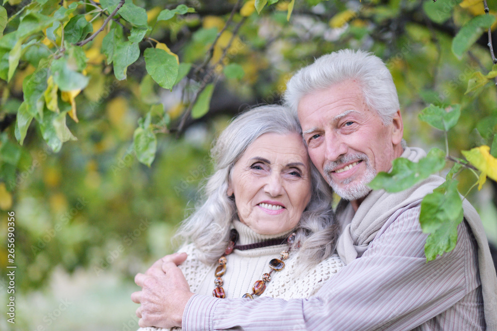 Close-up portrait of beautiful senior couple hugging Close-up portrait of beautiful senior couple hugging