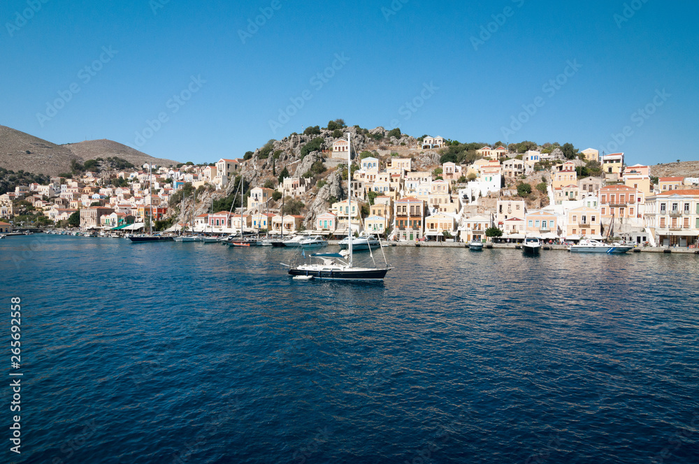 The pier and the picturesque seafront of Symi.