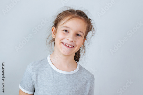 Little child girl posing at studio.Perfect emotional portrait fashion kid. Beautiful face caucasian child 6-7 years