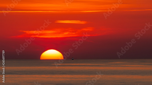 Fototapeta Naklejka Na Ścianę i Meble -  A beautiful sunrise off the coast of St Simons Island in Georgia