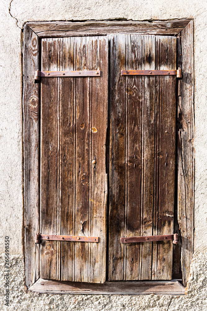 Old rusty wooden window in the Pyrinees Old rusty wooden window in the Pyrinees