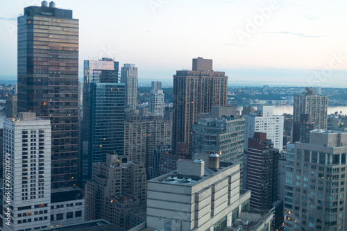 Background of skyscrapers in the early morning sun with Hudson River in the background (New York City) © Susan