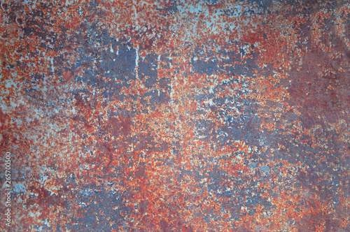 rusty metal textured, old metal iron rust background , corroded ,metal background.old cracked multicolored paint on rusty iron close up.