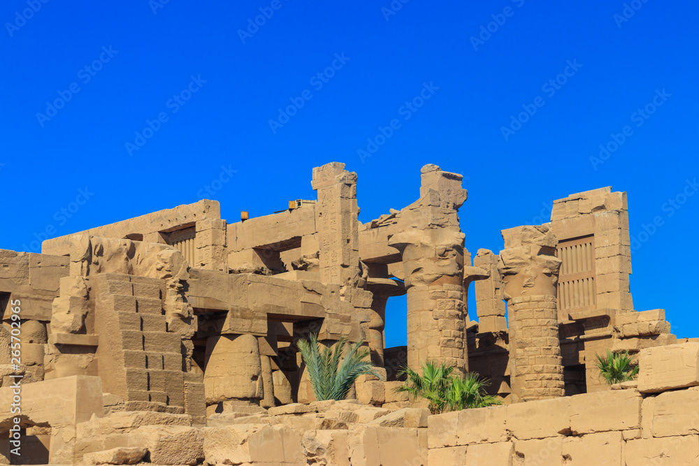 Karnak Temple Complex, commonly known as Karnak comprises a vast mix of decayed temples, chapels, pylons, and other buildings in Luxor, Egypt Karnak Temple Complex, commonly known as Karnak comprises a vast mix of decayed temples, chapels, pylons, and other buildings in Luxor, Egypt