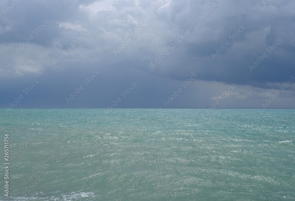thunderclouds over waves of Mediterranean Sea. Belek. Turkey
