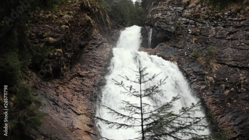 Beautiful waterfall in the Carpathian mountains - Bride's vail waterfall. Cascada valul miresei. photo