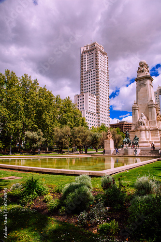 “Plaza de España” Madrid. View of the Cervantes monument and the Spain Building “Edificio Espana” on the Square of Spain “Plaza de Espana”. Madrid, Spain. Picture taken – 26 April 2019.