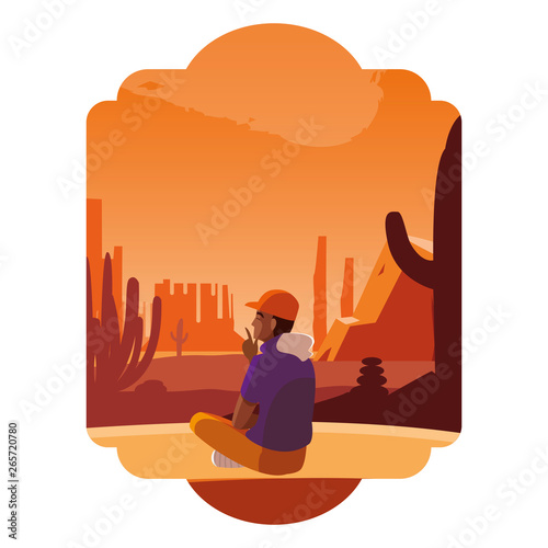 afro man contemplating horizon in the desert scene
