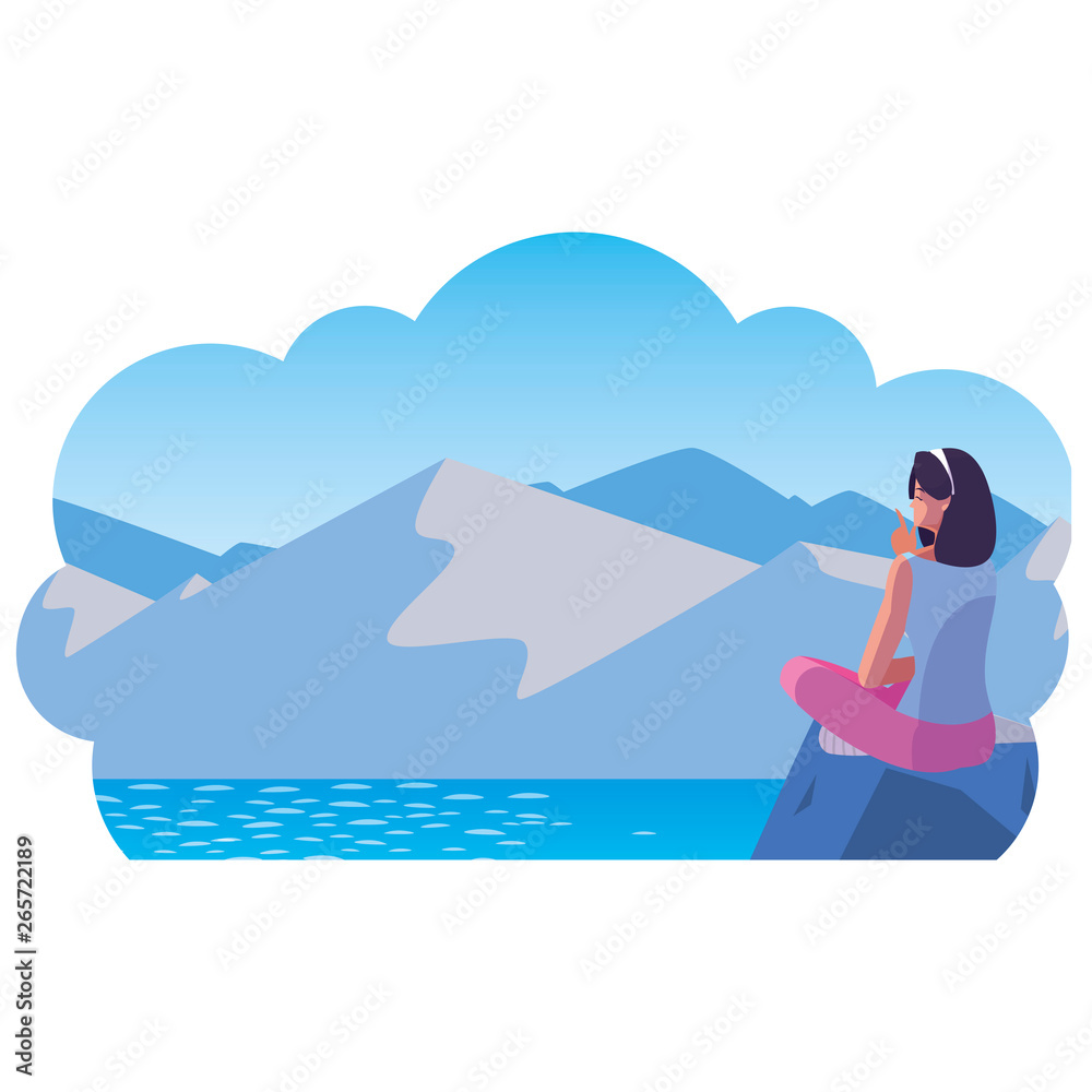 woman contemplating horizon in lake and mountains scene
