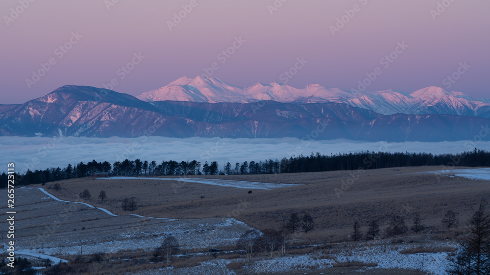 winter landscape with sea of clouds and mountains