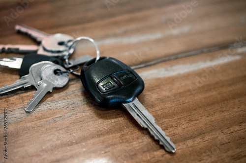 Key of car on wooden table,Transportation concept