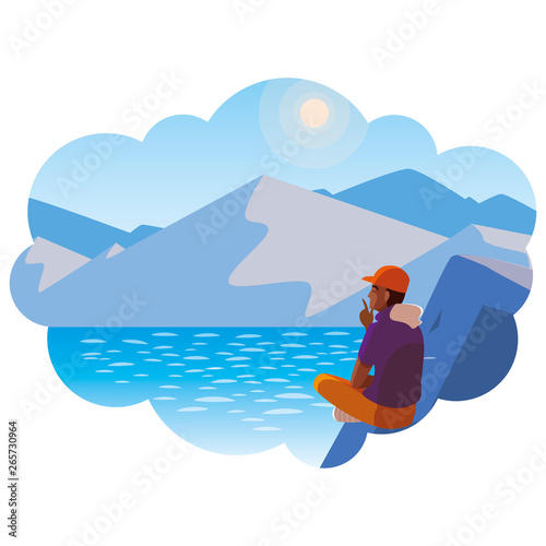 afro man contemplating horizon in lake and mountains scene